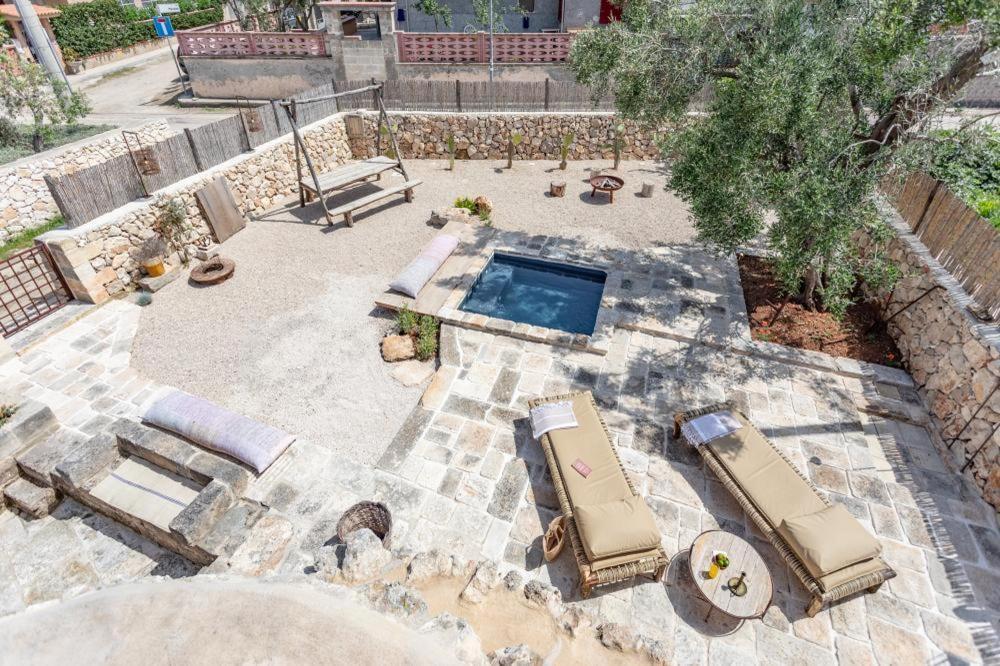 Bed and Breakfast Trullo Santovia Сант'Ізідоро Екстер'єр фото