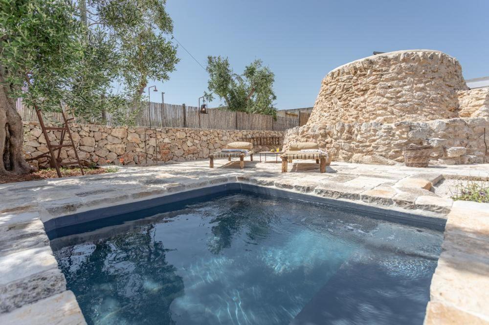 Bed and Breakfast Trullo Santovia Сант'Ізідоро Екстер'єр фото